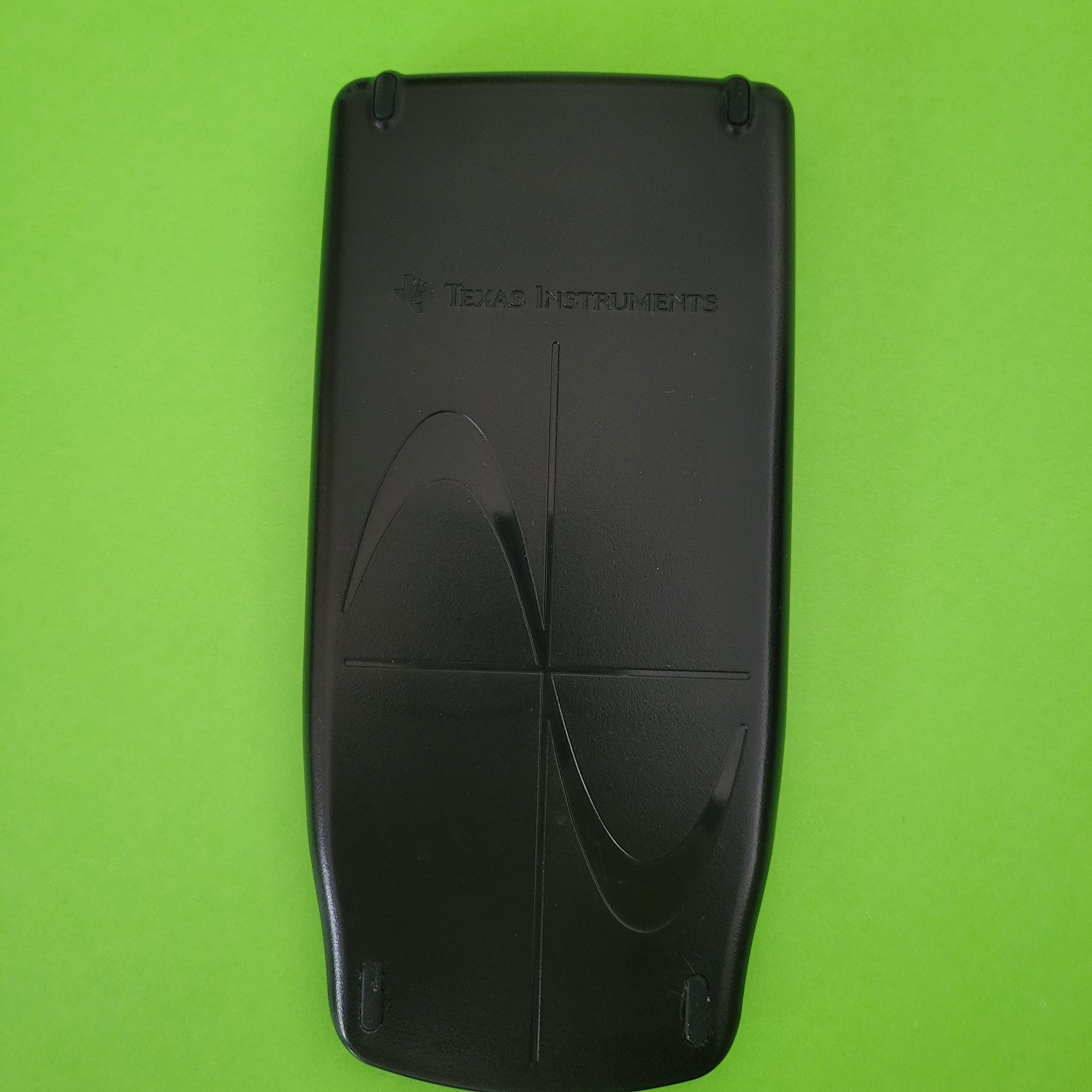 An image of the case of a texas instruments ti83 plus graphing calculator